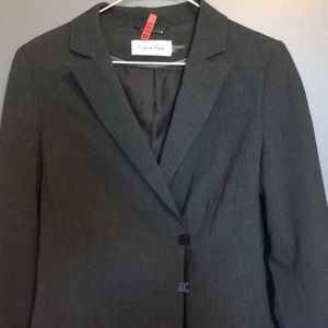 Calvin Klein lined unique puzzle button Blazer